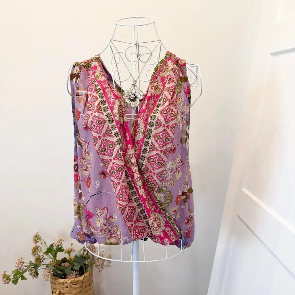 The prettiest free people boho floral gathered wrap v neck blouse